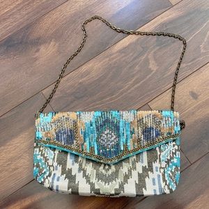 Chico’s Clutch Envelope BAG. Approx 10”x6”. Multi Desert Colors Bronze & Blues.